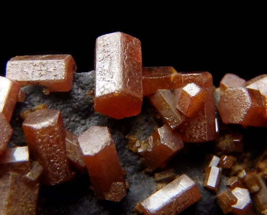 Vanadinite crystals on Coronadite from Morocco are not just pretty but very cool. Lets learn all about them.