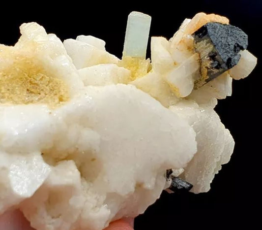 Check out this Sky Blue Aquamarine & Tourmaline On Feldspar Specimen From Pakistan. How does it form and why do we mine it?