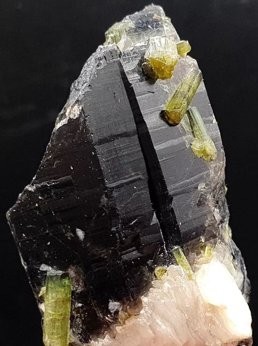 well lookie here! What is Green Tourmaline on Smoky Quartz Crystal from Pakistan? How do they mine this? Lets learn a little bit about its historical significance and how it forms.