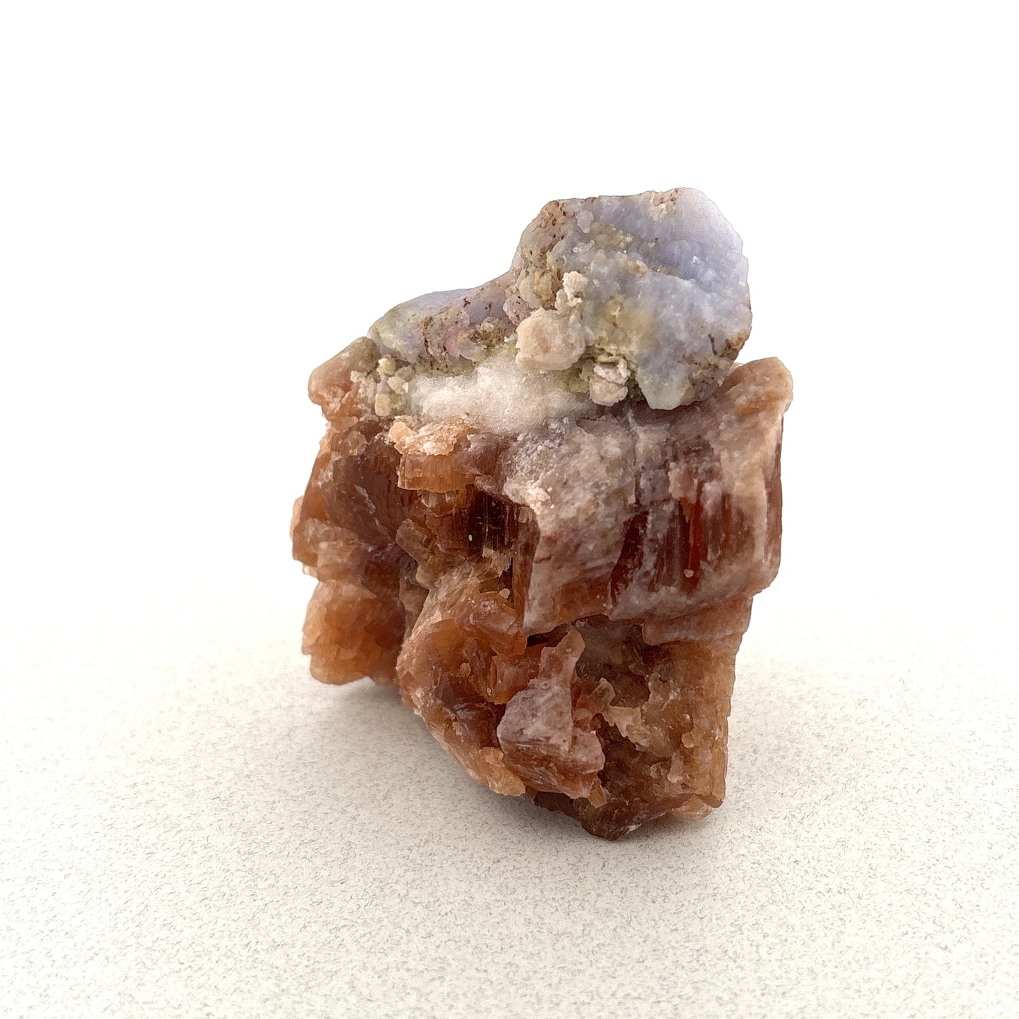Fluorescent Hackmanite & Calcite on Quartz, Pakistan, 120.42gr