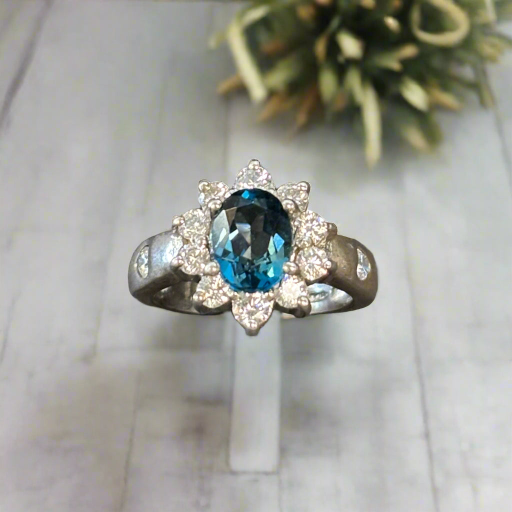 Estate Blue Topaz 8x6mm and CZ Ring set in Sterling Silver, 4.5gr.