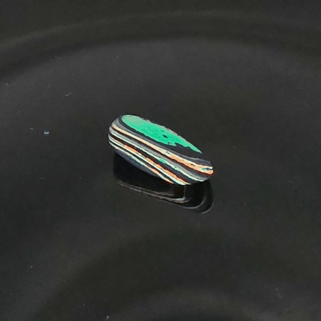 Funkrite Free From Cabocheon “Fordite” Galveston, TX, 29x15x8mm, 14.43ct - Highly Fluorescent