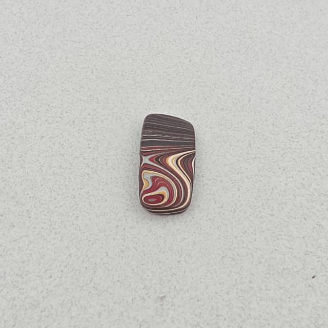 Corvettite Free From, 4.72ct, 26x11x3mm "Fordite" Bowling Green, KY, USA