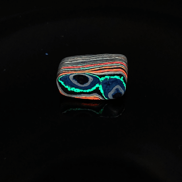 Funkrite Free From Cabocheon “Fordite” Galveston, TX, 28x17x12mm, 35.94ct - HIGHLY FLOURESCENT