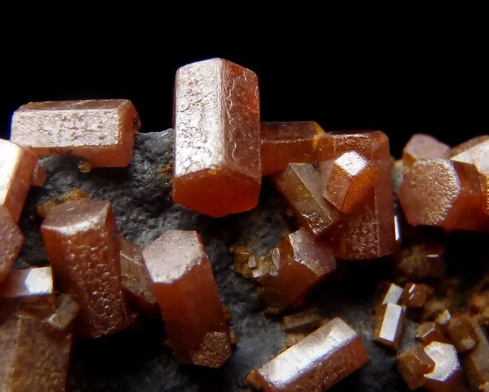Vanadinite crystals on Coronadite from Morocco are not just pretty but very cool. Lets learn all about them.