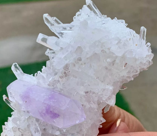 What is a Chrysanthemum crystal Cluster with Amethyst Specimen and how does it form?
