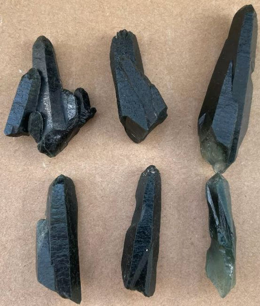 Check out these black green moss quartz crystals from China. How do these form, why and how do we mine them?