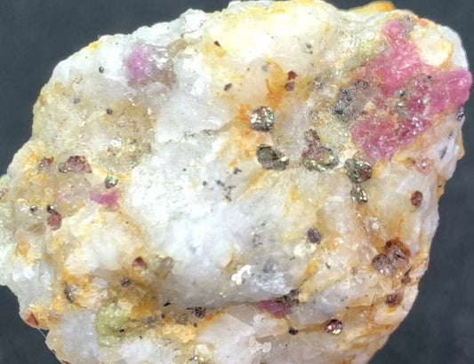 Ever seen Afghanistani Ruby, Corundum, & Pyrite Crystals in Matrix? What is it and how does something like this form? Let's learn a bit about it!