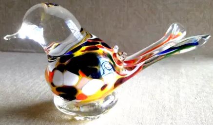 What a cute little Vintage Colorful Mouthblown Glass Bird from 1950s Germany. What is the history of glass blowing in Germany and what is its cultural significance?