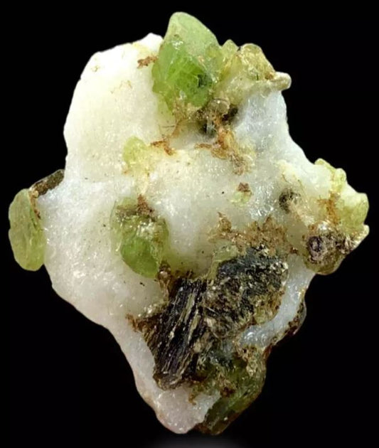 What is a Fully Terminated Green Diopside Crystal On Matrix? What are they and how do they form?