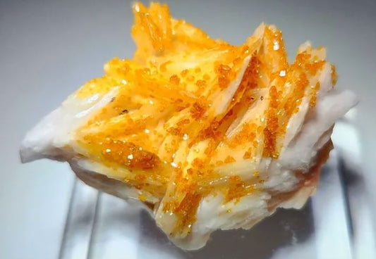 What cute little Sparkling Vanadinite crystals on Barite matrix, mined Morocco. How does it form and how does it mine.