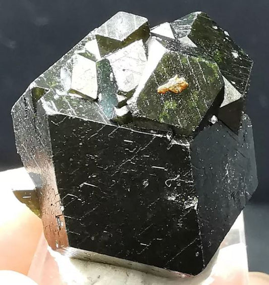 Check out this Natural Dark Green Octahedral Garnet Andradite Specimen. Let's learn all about these interesting minerals!