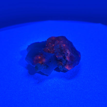 Fluorescent Hackmanite on Quartz, Pakistan, 51.64gr, 45x43x25mm