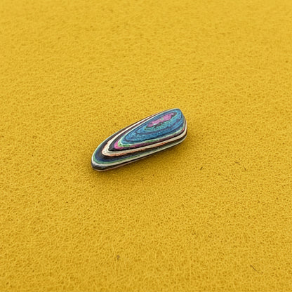 Funkrite Free From Cabocheon “Fordite” Galveston, TX, 29x15x8mm, 14.43ct - Highly Fluorescent