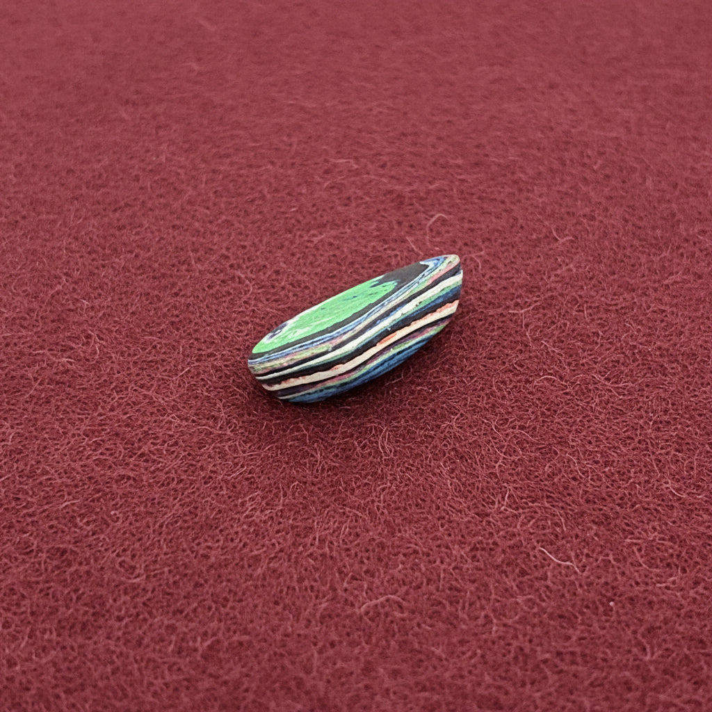 Funkrite Free From Cabocheon “Fordite” Galveston, TX, 29x15x8mm, 14.43ct - Highly Fluorescent
