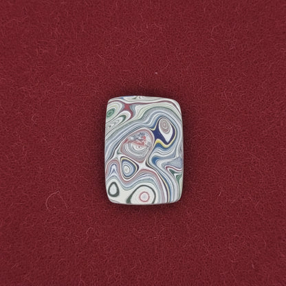 Heil Garbage Truck Fordite Free Form Caboceon, Heil (Milwaukee, WI) 22x16x3mm, 6.38ct