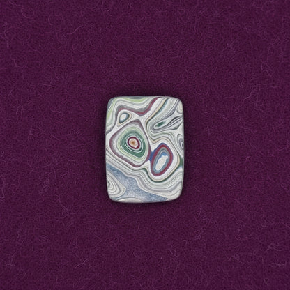 Heil Garbage Truck Fordite Free Form Caboceon, Heil (Milwaukee, WI) 22x16x3mm, 6.38ct