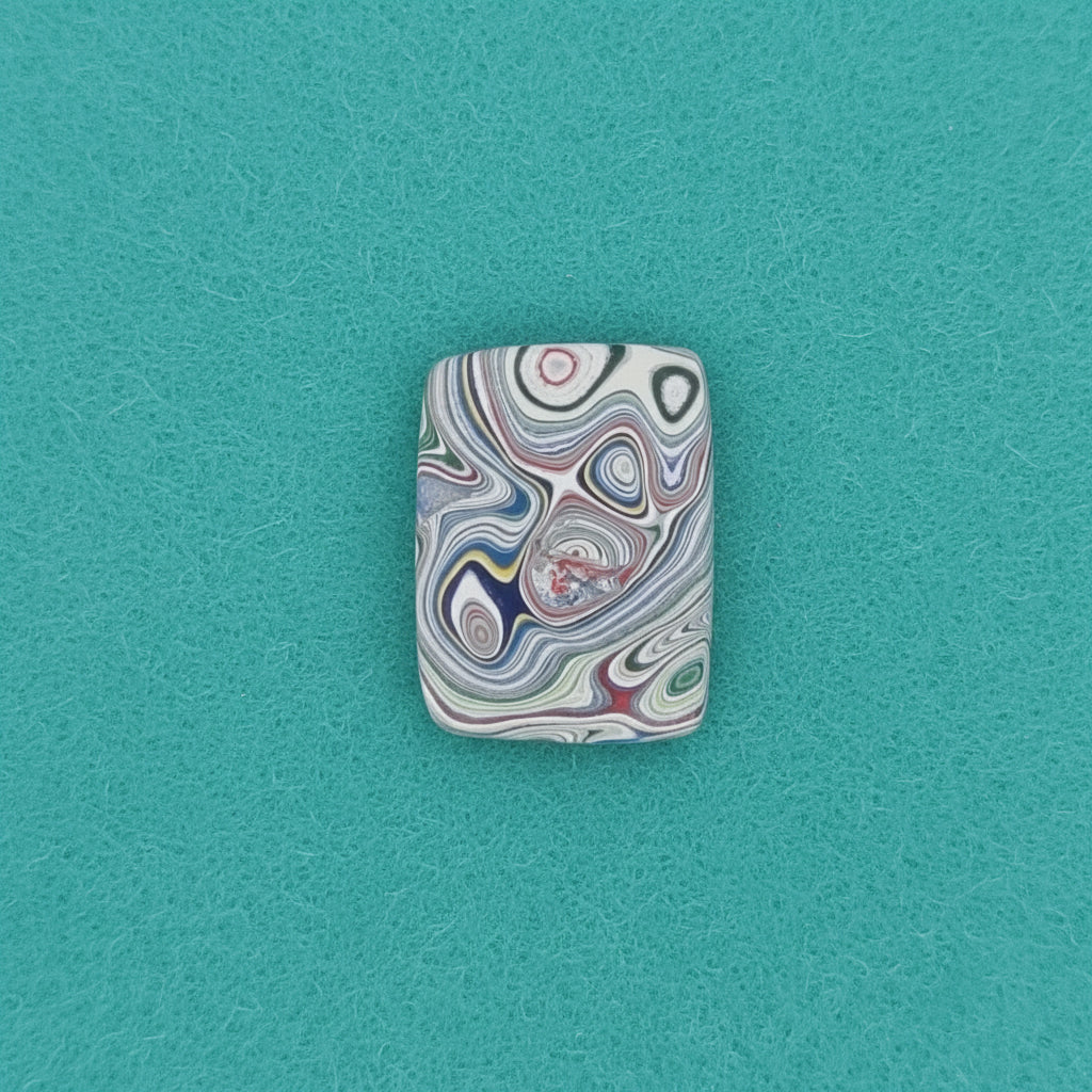 Heil Garbage Truck Fordite Free Form Caboceon, Heil (Milwaukee, WI) 22x16x3mm, 6.38ct
