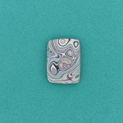 Heil Garbage Truck Fordite Free Form Caboceon, Heil (Milwaukee, WI) 22x16x3mm, 6.38ct