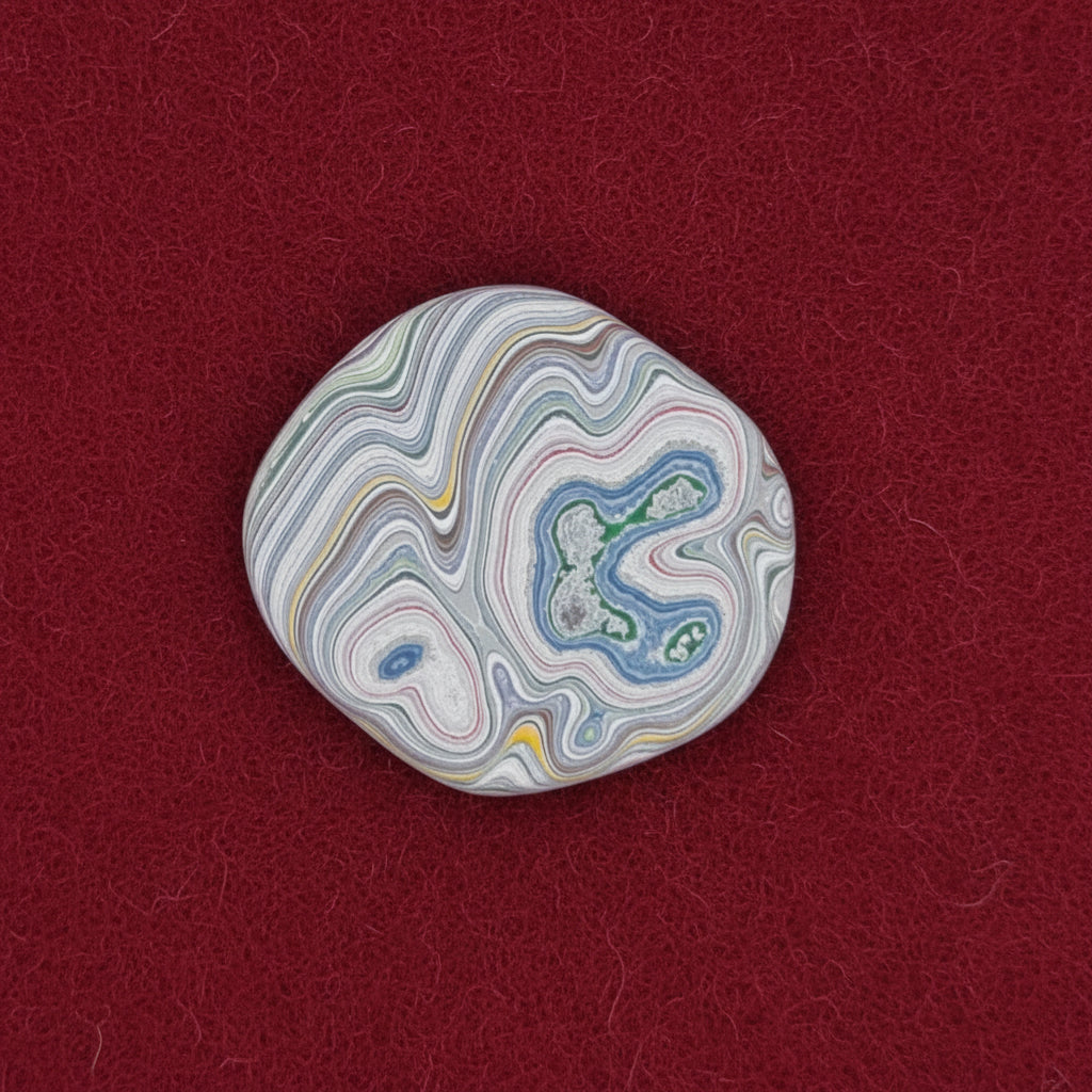 Heil Garbage Truck Fordite Free Form Caboceon, Heil (Milwaukee, WI) 28x25x3mm, 13.88ct