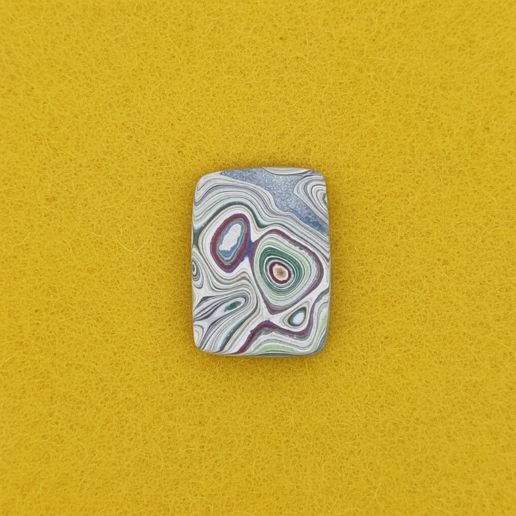 Heil Garbage Truck Fordite Free Form Caboceon, Heil (Milwaukee, WI) 22x16x3mm, 6.38ct