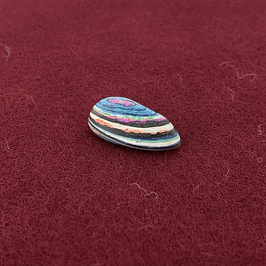Funkrite Free From Cabocheon “Fordite” Galveston, TX, 29x15x8mm, 14.43ct - Highly Fluorescent
