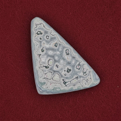 Heil Garbage Truck Fordite Free Form Caboceon, Heil (Milwaukee, WI) 42x25x5mm, 21.99ct
