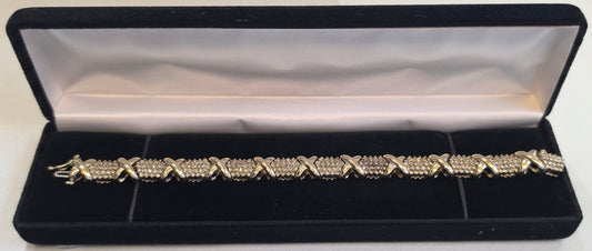 4cttw natural diamond "Hugs and Kisses" tennis bracelet, 10k Yellow Gold 28.13gr, 20cm long