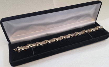 4cttw natural diamond "Hugs and Kisses" tennis bracelet, 10k Yellow Gold 28.13gr, 20cm long