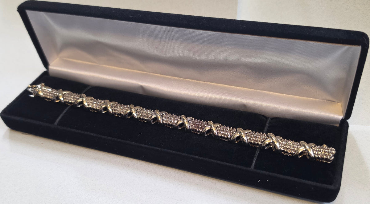 4cttw natural diamond "Hugs and Kisses" tennis bracelet, 10k Yellow Gold 28.13gr, 20cm long