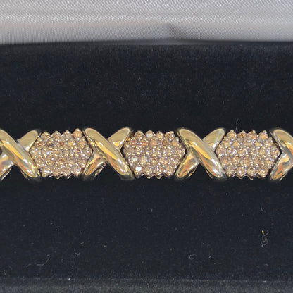 4cttw natural diamond "Hugs and Kisses" tennis bracelet, 10k Yellow Gold 28.13gr, 20cm long