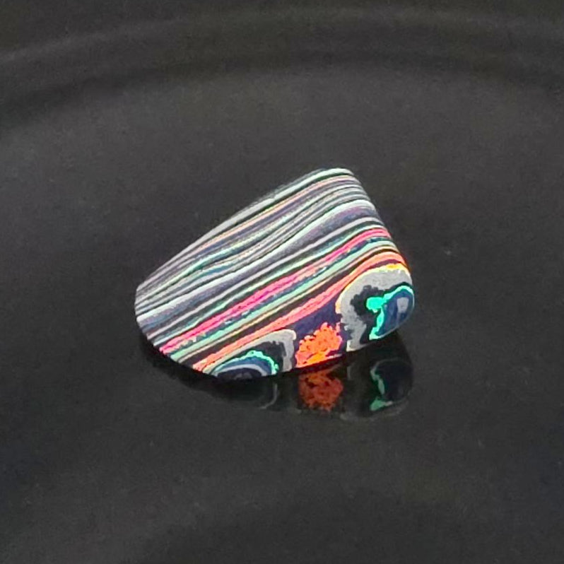 Funkrite Free From Cabocheon “Fordite” Galveston, TX, 26x18x12mm, 24.41ct - Highly Fluorescent
