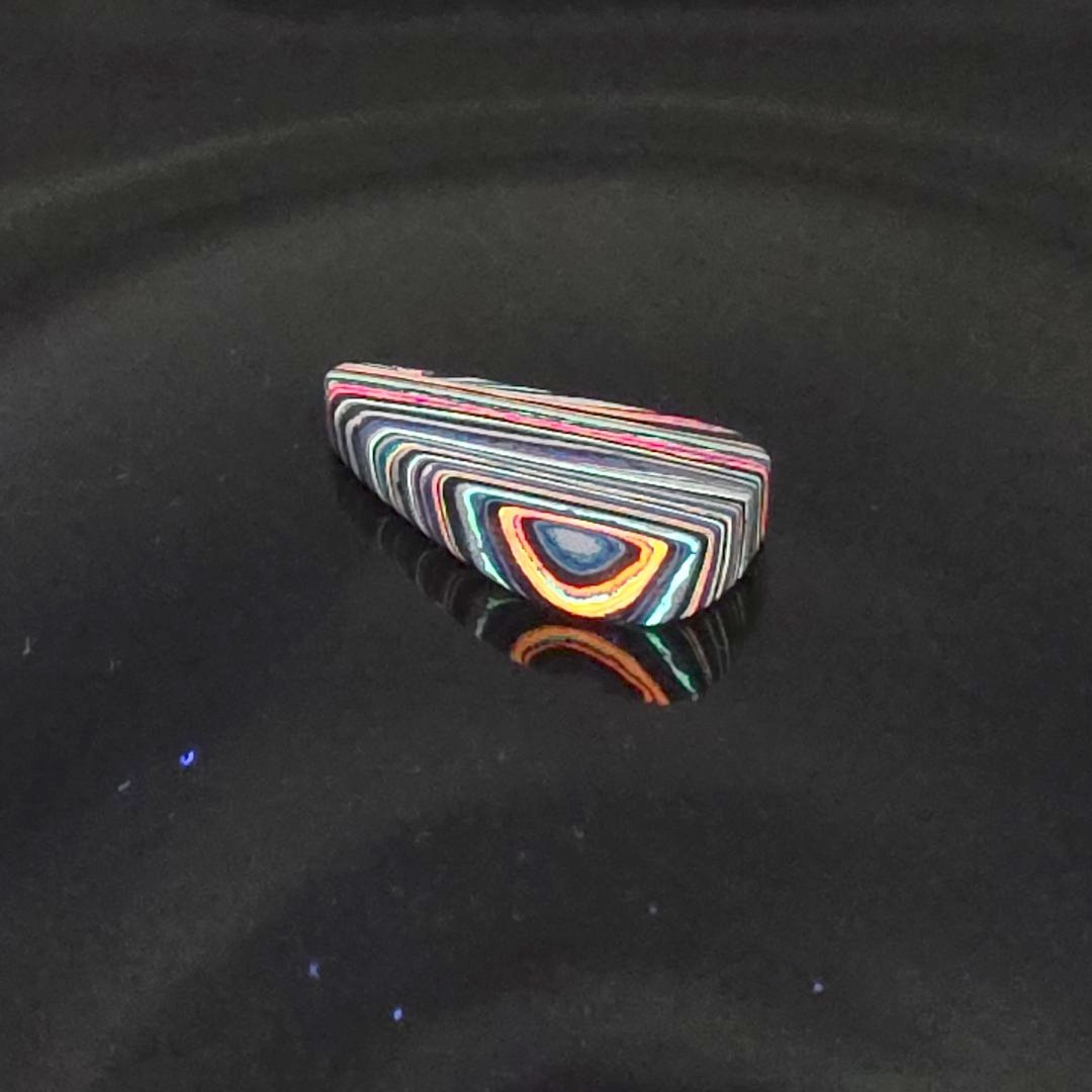 Funkrite Free From Cabocheon “Fordite” Galveston, TX, 36x17x7mm, 22.50ct - Highly Fluorescent
