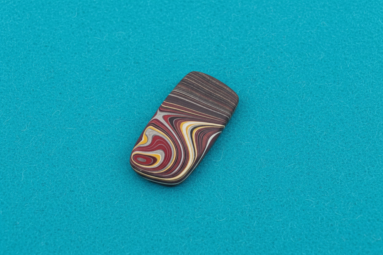 Corvettite Free From, 4.72ct, 26x11x3mm "Fordite" Bowling Green, KY, USA