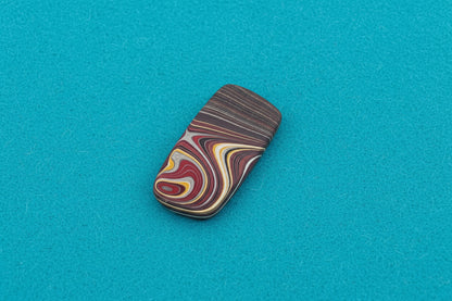 Corvettite Free From, 4.72ct, 26x11x3mm "Fordite" Bowling Green, KY, USA