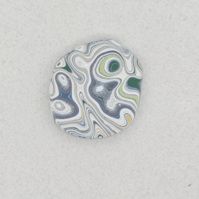 Heil Garbage Truck Fordite Free Form Caboceon, Heil (Milwaukee, WI) 28x25x3mm, 13.88ct