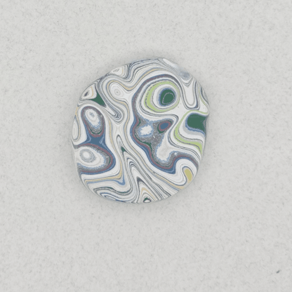 Heil Garbage Truck Fordite Free Form Caboceon, Heil (Milwaukee, WI) 28x25x3mm, 13.88ct
