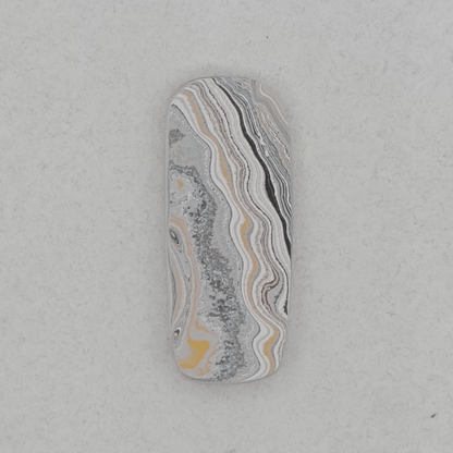 Heil Garbage Truck Fordite Free Form Caboceon, Heil (Milwaukee, WI) 41x17x3mm, 15.85ct