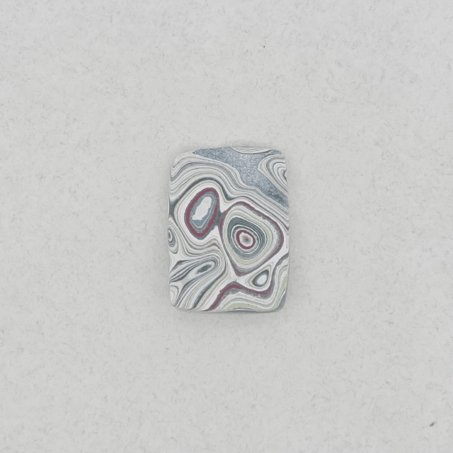 Heil Garbage Truck Fordite Free Form Caboceon, Heil (Milwaukee, WI) 22x16x3mm, 6.38ct