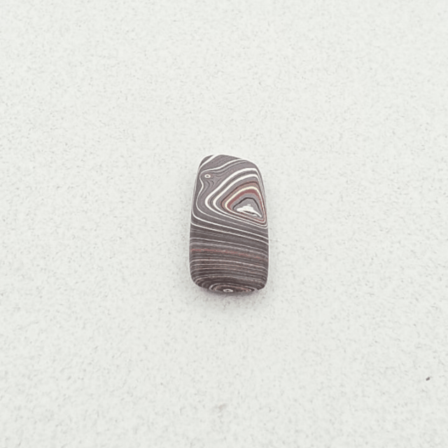 Corvettite Free From, 4.72ct, 26x11x3mm "Fordite" Bowling Green, KY, USA