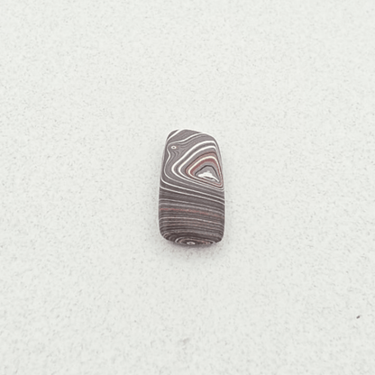 Corvettite Free From, 4.72ct, 26x11x3mm "Fordite" Bowling Green, KY, USA