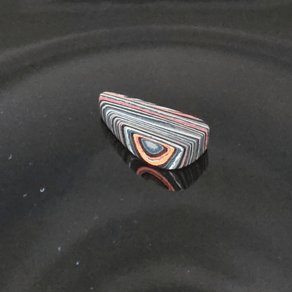 Funkrite Free From Cabocheon “Fordite” Galveston, TX, 36x17x7mm, 22.50ct - Highly Fluorescent
