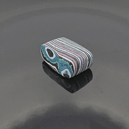 Funkrite Free From Cabocheon “Fordite” Galveston, TX, 28x17x12mm, 35.94ct - HIGHLY FLOURESCENT
