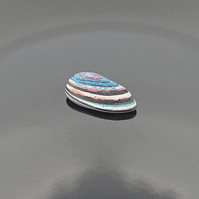 Funkrite Free From Cabocheon “Fordite” Galveston, TX, 29x15x8mm, 14.43ct - Highly Fluorescent