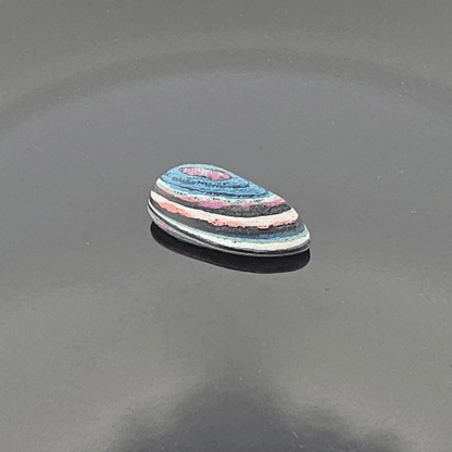 Funkrite Free From Cabocheon “Fordite” Galveston, TX, 29x15x8mm, 14.43ct - Highly Fluorescent