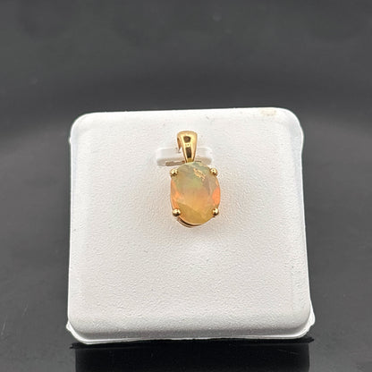 14K Etheopian Opal Pendant, 9.15x7.1mm, 1.05gr