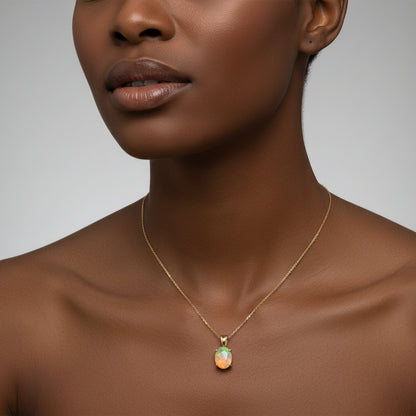 14K Etheopian Opal Pendant, 9.15x7.1mm, 1.05gr