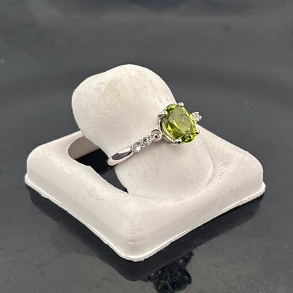 10K Natural Peridot Ring with CZ Side Stones, 7x5mm, 0.8ct, Afghanistan
